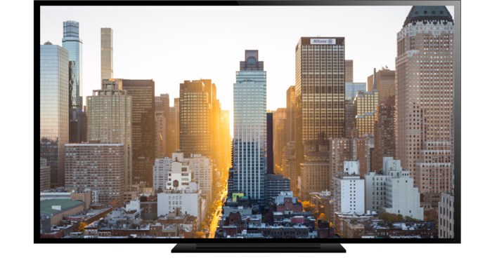 Skyline einer Stadt auf einem Fernseher dargestellt.